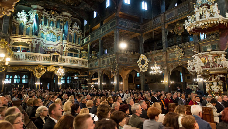 Members of the congregation listening to His Holiness the Dalai Lama speaking at the Church of Peace in Swidnica, Poland on September 21, 2016. Photo/Maciej Kulczynski