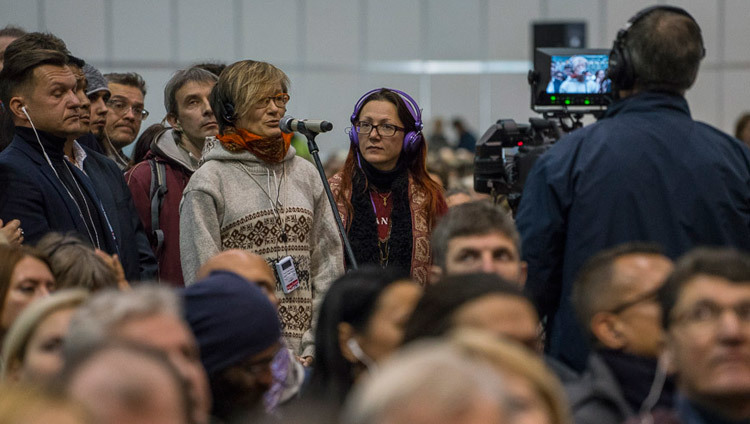 A member of the audience asking His Holiness the Dalai Lama a question on the final day of his teachings in Riga, Latvia on October 11, 2016. Photo/Tenzin Choejor/OHHDL