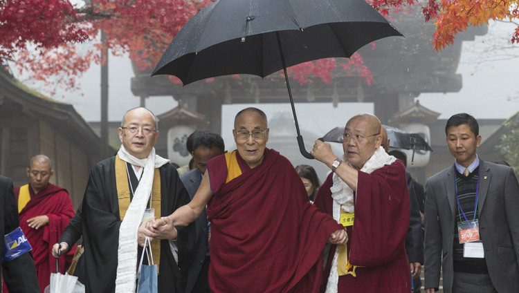 His Holiness the Dalai Lama walking to the hall in the morning mist for his talk in Koyasan, Japan on November 15, 2016. Photo/Jigme Choephel