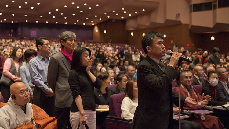 Members of the audience lined up to ask His Holiness the Dalai Lama a question during his talk at the Pacifico Yokohama Hall in Yokohama, Japan on November 17, 2016.