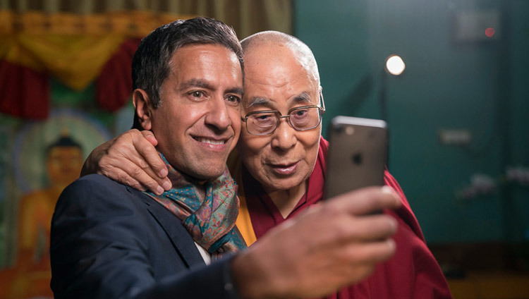 Dr Sanjay Gupta taking a selfie with His Holiness the Dalai Lama after their interview at Drepung Loseling in Mundgod, Karnataka, India on December 19, 2016. Photo/Tenzin Choejor/OHHDL