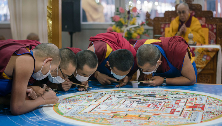 Monks from Namgyal Monastery working on the construction of the sand mandala during the preparation rituals for the Kalachakra Empowerment in Bodhgaya, Bihar, India on January 7, 2017. Photo/Tenzin Choejor/OHHDL