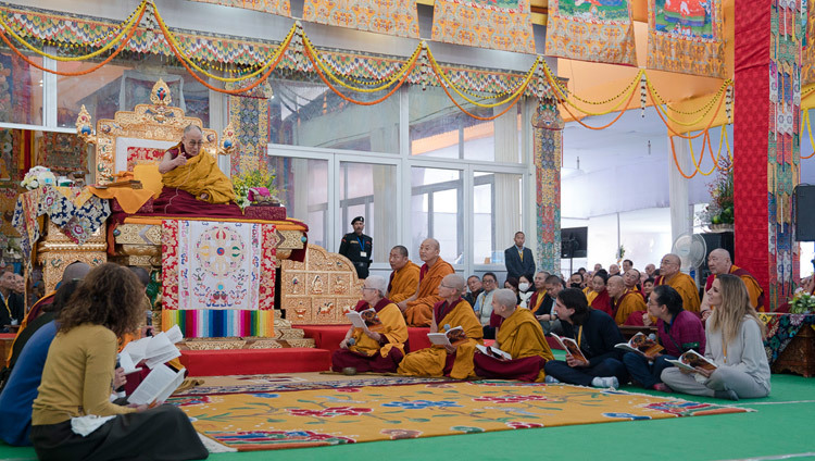 A group of monks, nuns and lay-people reciting the "Heart Sutra" in Spanish at the start of the third and final day of the actual Kalachakra Empowerment in Bodhgaya, Bihar, India on January 13, 2017. Photo/Tenzin Choejor/OHHDL