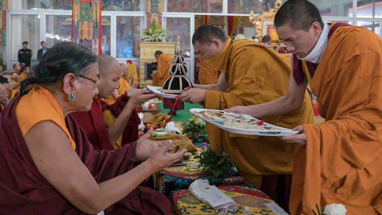 Monks from Namgyal Monastery presenting ritual objects to Sakya Trizin and Gyalwang Karmapa during the third and final day of the actual Kalachakra Empowerment in Bodhgaya, Bihar, India on January 13, 2017. Photo/Tenzin Choejor/OHHDL