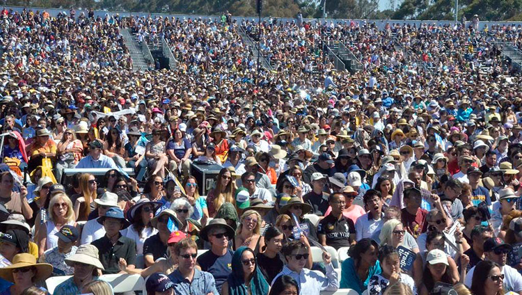 Some of the more that 25,000 people attending His Holiness the Dalai Lama's talk at UC San Diego's RIMAC Field in San Diego, CA, USA on June 16, 2017. Photo by Chris Stone