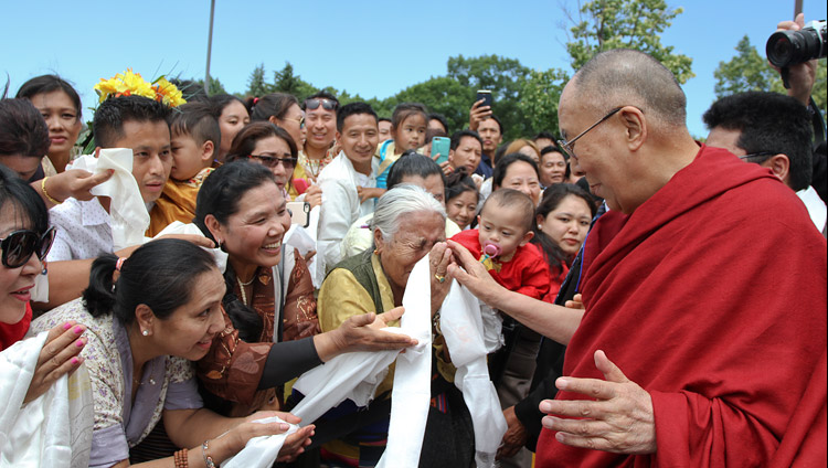 His Holiness the Dalai Lama greeting some of the over 400 Tibetans gathered to welcome him on his arrival in Minneapolis, MN, USA on June 21, 2017. Photo by Tenzin Phuntsok Waleag