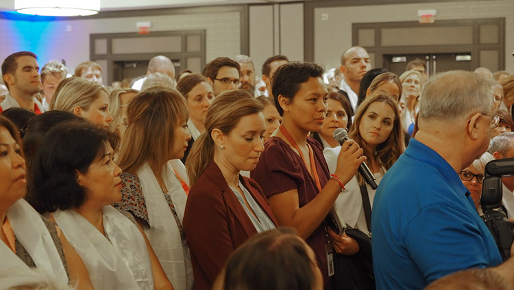 A member of the audience asking His Holiness the Dalai Lama a question during his talk at Starkey Hearing Technologies in Minneapolis, MN, USA on June 22, 2017. Photo by Jeremy Russell/OHHDL