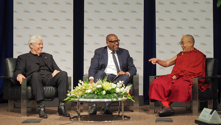 Bill Austin and Forest Whitaker look on as His Holiness the Dalai Lama speaks during the discussion on compassion at the Starkey Campus in Minneapolis, MN, USA on June 23, 2017. Photo by Jeremy Russell/OHHDL