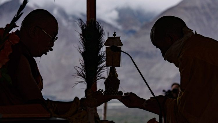 The mountains loom in the background as His Holiness the Dalai Lama confers the White Tara Long-Life Empowerment in Disket, Nubra Valley, J&K, India on July 13, 2017. Photo by Tenzin Choejor/OHHDL