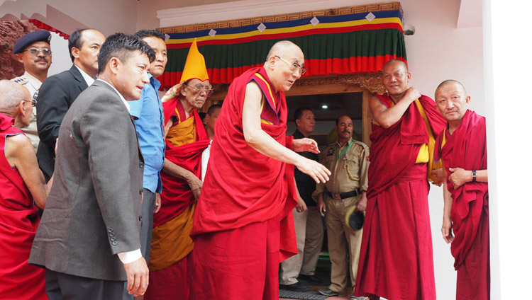 His Holiness the Dalai Lama briefly stops to acknowledge members of the local community who gathered to welcome him on his arrival at Samstanling Monastery in Sumar, Nubra Valley, J&K, India on July 13, 2017. Photo by Jeremy Russell/OHHDL