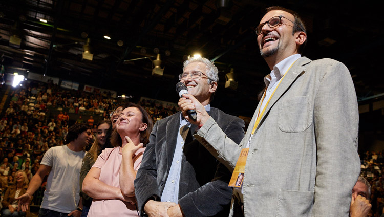 A member of the audience asking His Holiness the Dalai Lama a question during his talk at the Mandela Forum in Florence, Italy on September 19, 2017. Photo by Olivier Adam