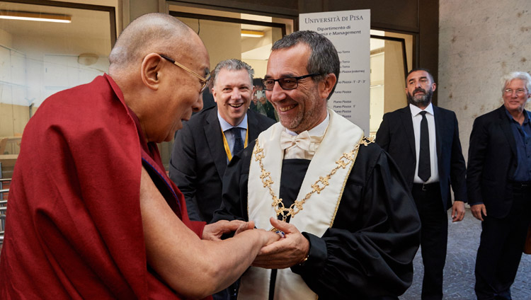 University of Pisa Rector Prof Paolo Mancarella welcoming His Holiness the Dalai Lama on his arrival at Pisa Congress Hall in Pisa, Italy on September 21, 2017. Photo by Olivier Adam