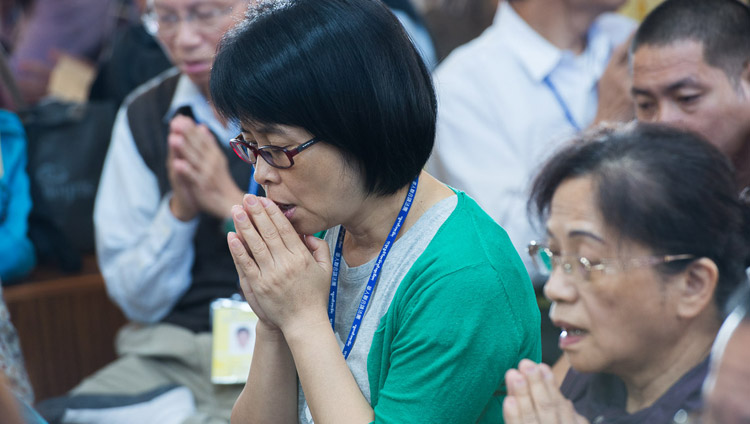 Members of the audience from Taiwan reciting the "Heart Sutra" in Chinese at the start of His Holiness the Dalai Lama's teaching at the Tsuglagkhang in Dharamsala, HP, India on October 3, 2017. Photo by Tenzin Phuntsok