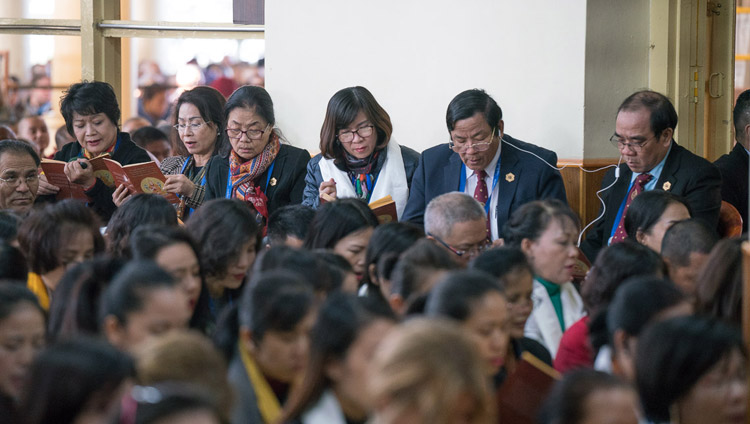 Sponsors and supporters of the new Namgyal Monastery school reciting the 'Heart Sutra' at the start of His Holiness the Dalai Lama's teachings at the Main Tibetan Temple in Dharamsala, HP, India on November 3, 2017. Photo by Tenzin Choejor