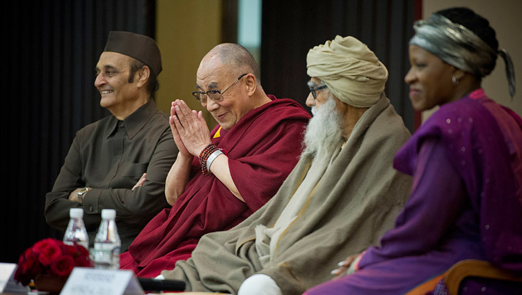 His Holiness the Dalai Lama greeting the audience at an interfaith program titled On World Religions: Diversity, Not Dissension in New Delhi on 9 March 2013. (Photo/Tenzin Choejor/OHHDL)