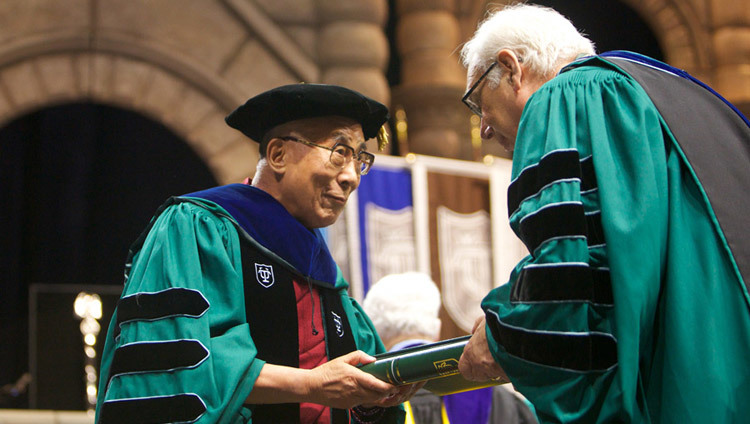 His Holiness the Dalai Lama accepting an honorary doctorate from Tulane University in New Orleans, Louisiana, USA on May 18, 2013.