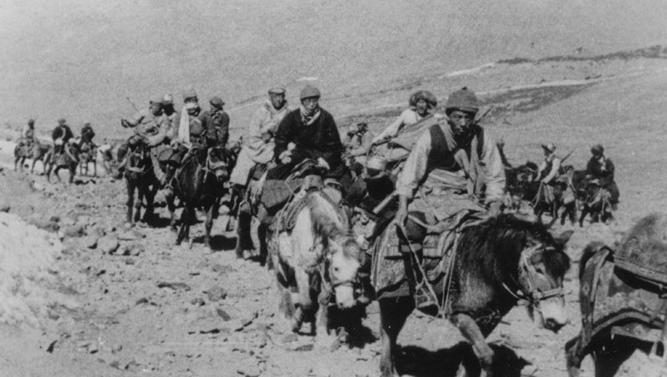 The 14th Dalai Lama fleeing Tibet into exile with Khampa (men from the Eastern province of Kham) bodyguards in March, 1959. (Photo/OHHDL)